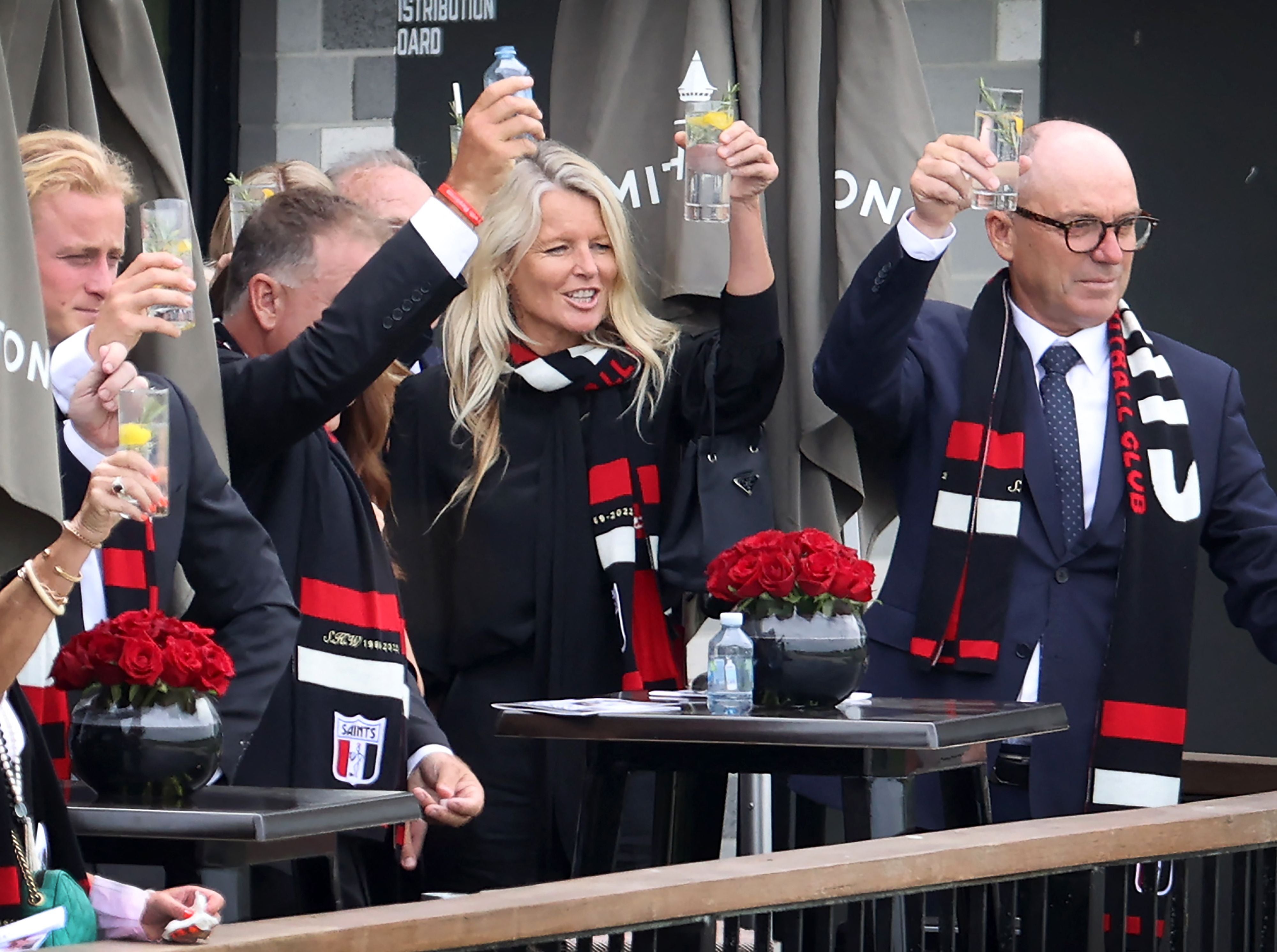 Simone Callahan, Warne’s former wife, toasts the hearse