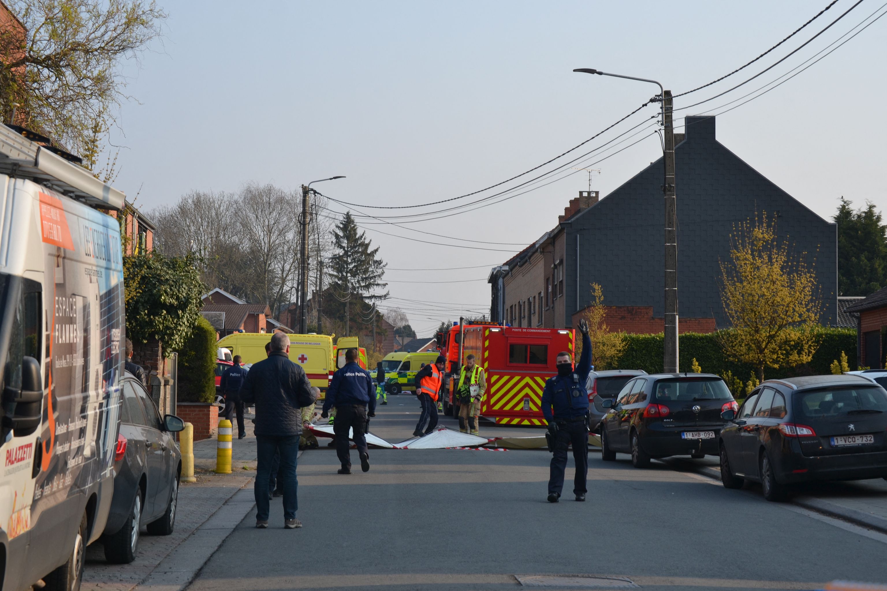 A large police security perimeter on the site where a car ran into a group of carnivalists in Strepy-Bracquegnies