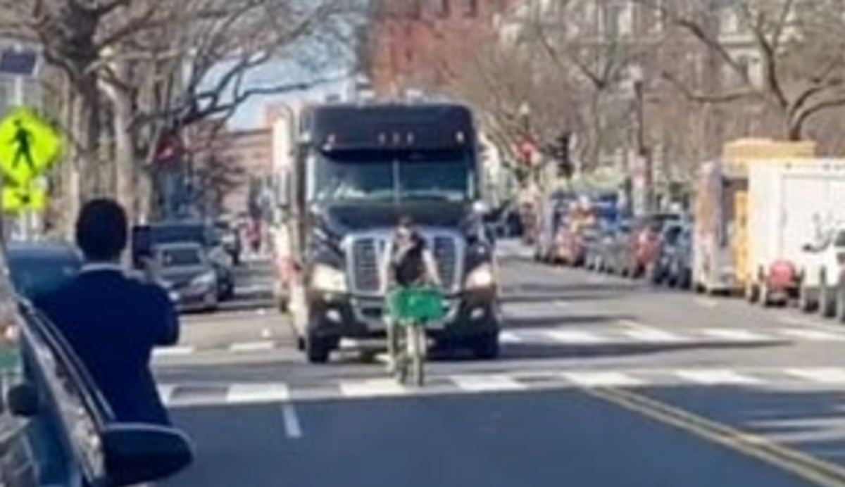 Trucker &lsquo;freedom convoy&rsquo; through Washington DC thwarted by one bike rider