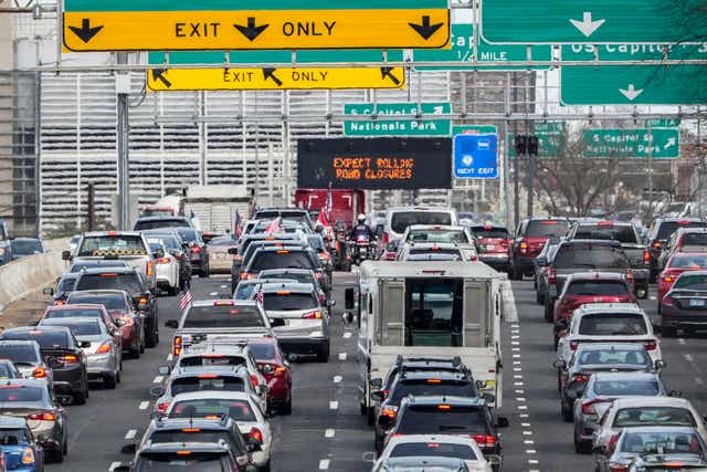 <p>Heavy traffic slowly crawls on I-395 due to the trucker convoy protest on March 18, 2022 in Washington, DC</p>