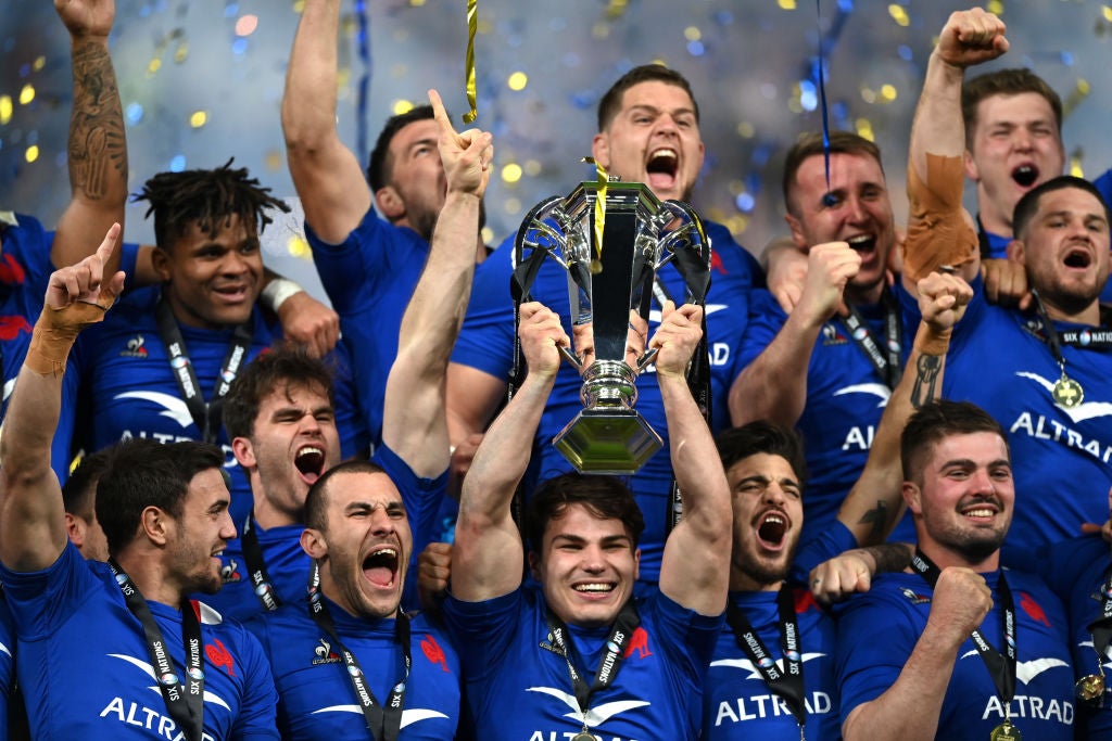 Antoine Dupont lifts the Six Nations trophy after France beat England to win the Grand Slam