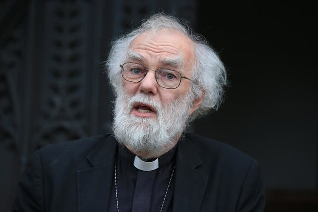 Former archbishop of Canterbury Dr Rowan Williams is among 200 church leaders calling for the UK Government to rule out investment in fossil fuels (Jonathan Brady/PA)