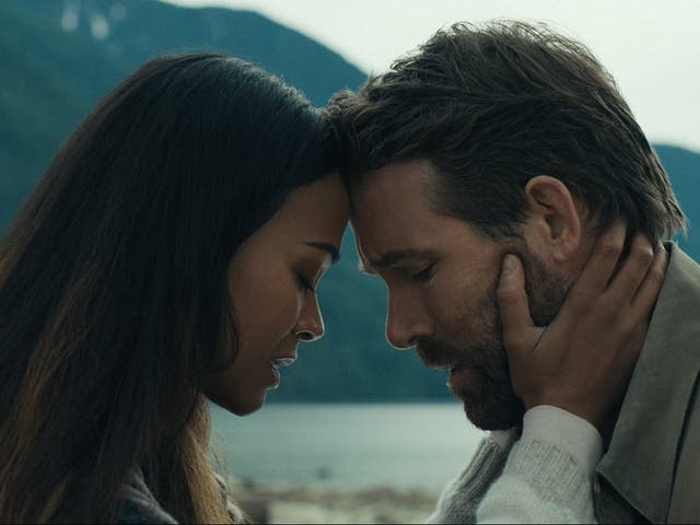 <p>Zoe Saldana and Ryan Reynolds in ‘The Adam Project'</p>