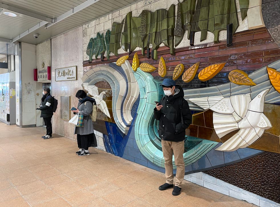 <p>Shoji Morimoto, 38, known as Japan’s ‘do-nothing guy’, waits for his client at an underground station outside Tokyo</p>