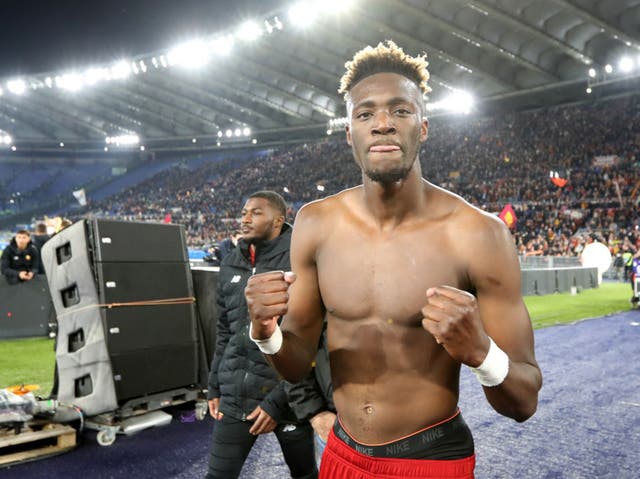 <p>Tammy Abraham celebrates after scoring twice in the Rome derby</p>