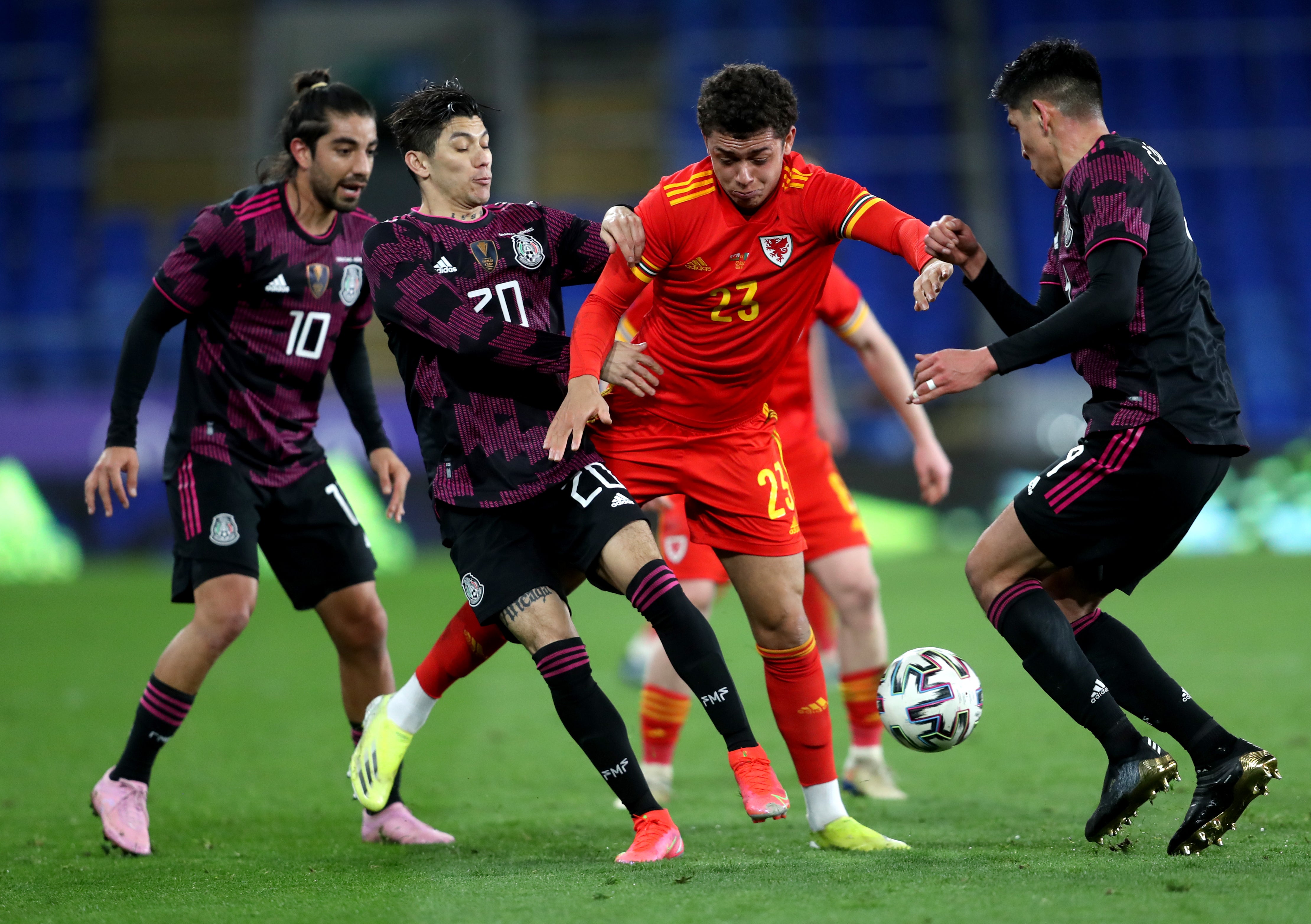 Brennan Johnson surrounded by Mexico defenders during Wales’ 1-0 friendly victory at Cardiff in March 2021