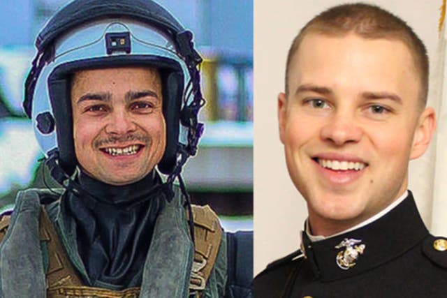 <p>Capt Ross A Reynolds (left) and Capt Matthew J Tomkiewicz (right) were among four US Marines who died when their tilt-rotor aircraft crashed during a training flight in Norway on Friday</p>