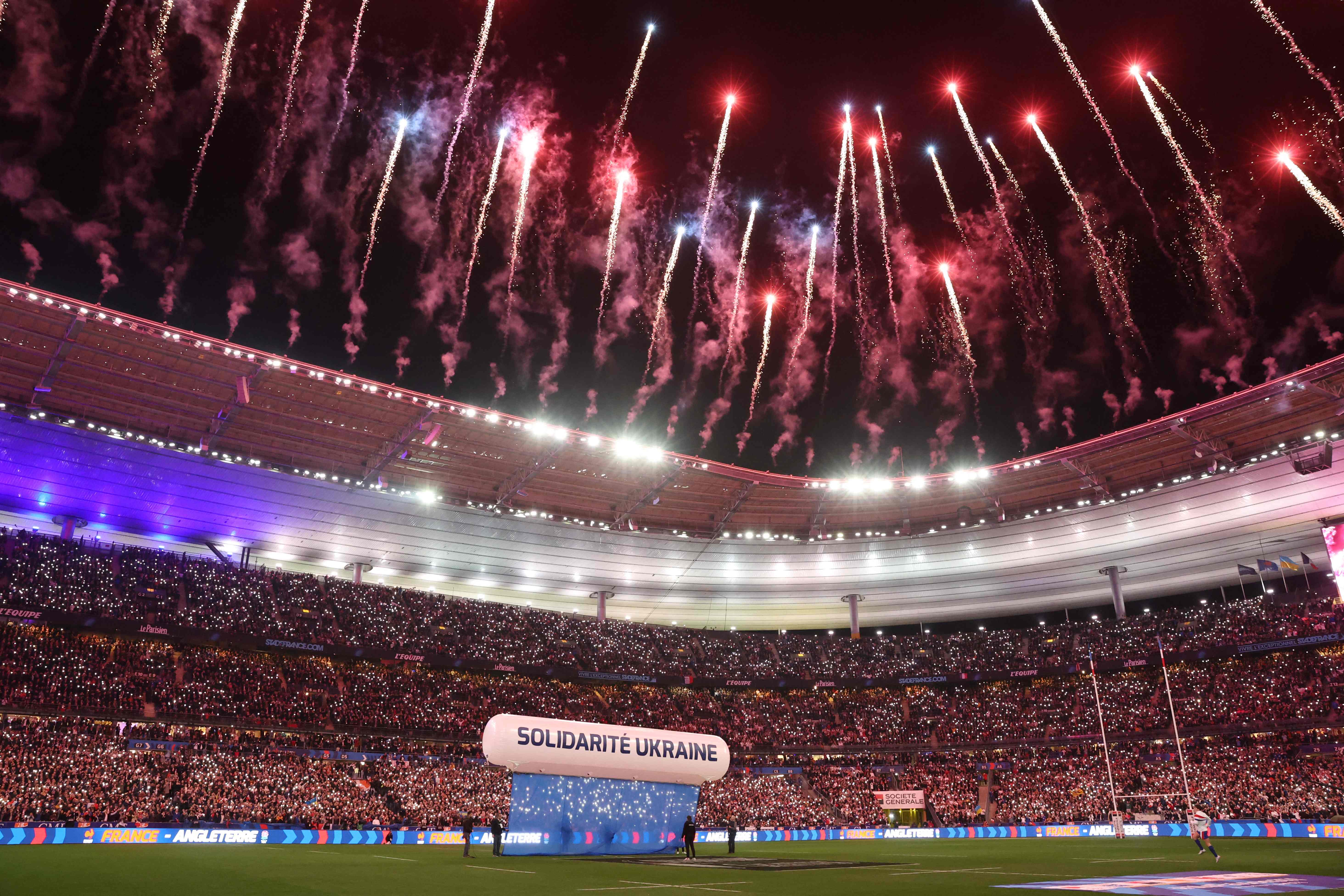 Fireworks light up the night sky above the Stade de France