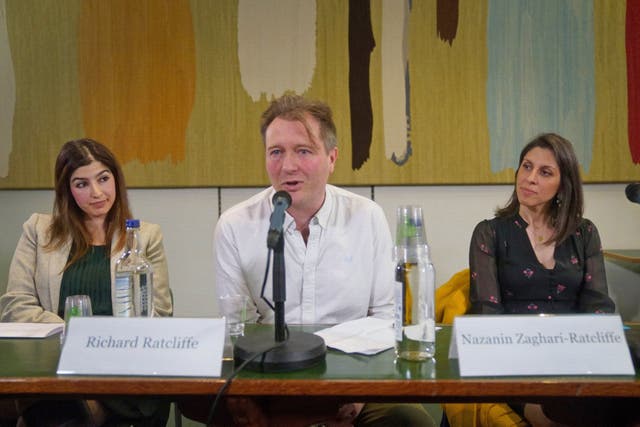<p>Roxanne Tahbaz (left), whose father is detained in Iran, attends a press conference with Richard Ratcliffe and his wife Nazanin Zaghari-Ratcliffe on 21 March, 2022.</p>