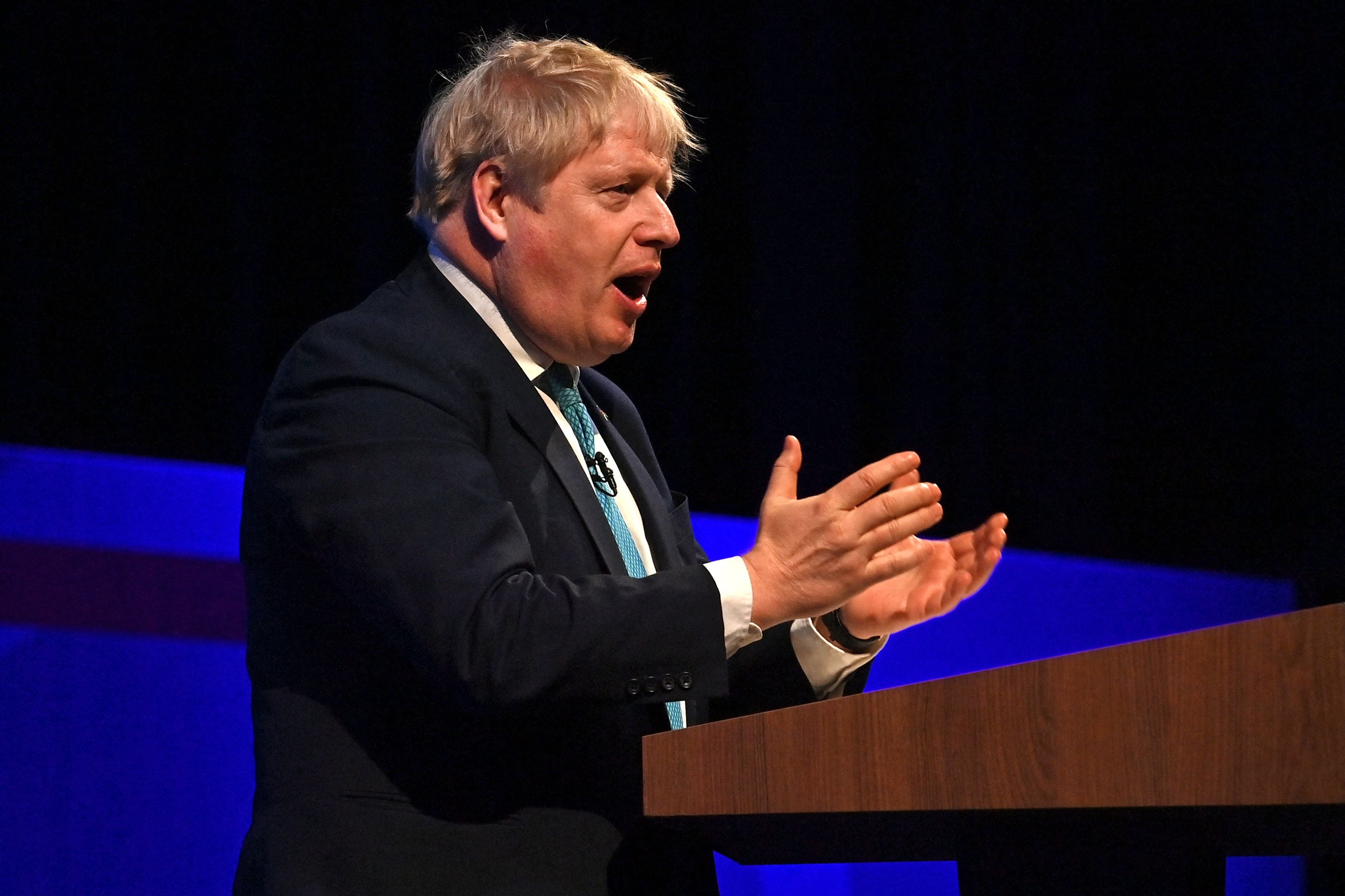 Britain’s Prime Minister Boris Johnson speaks during the Conservative Party Spring Conference at Blackpool Winter Gardens in Blackpool, north-west England, on 19 March 2022