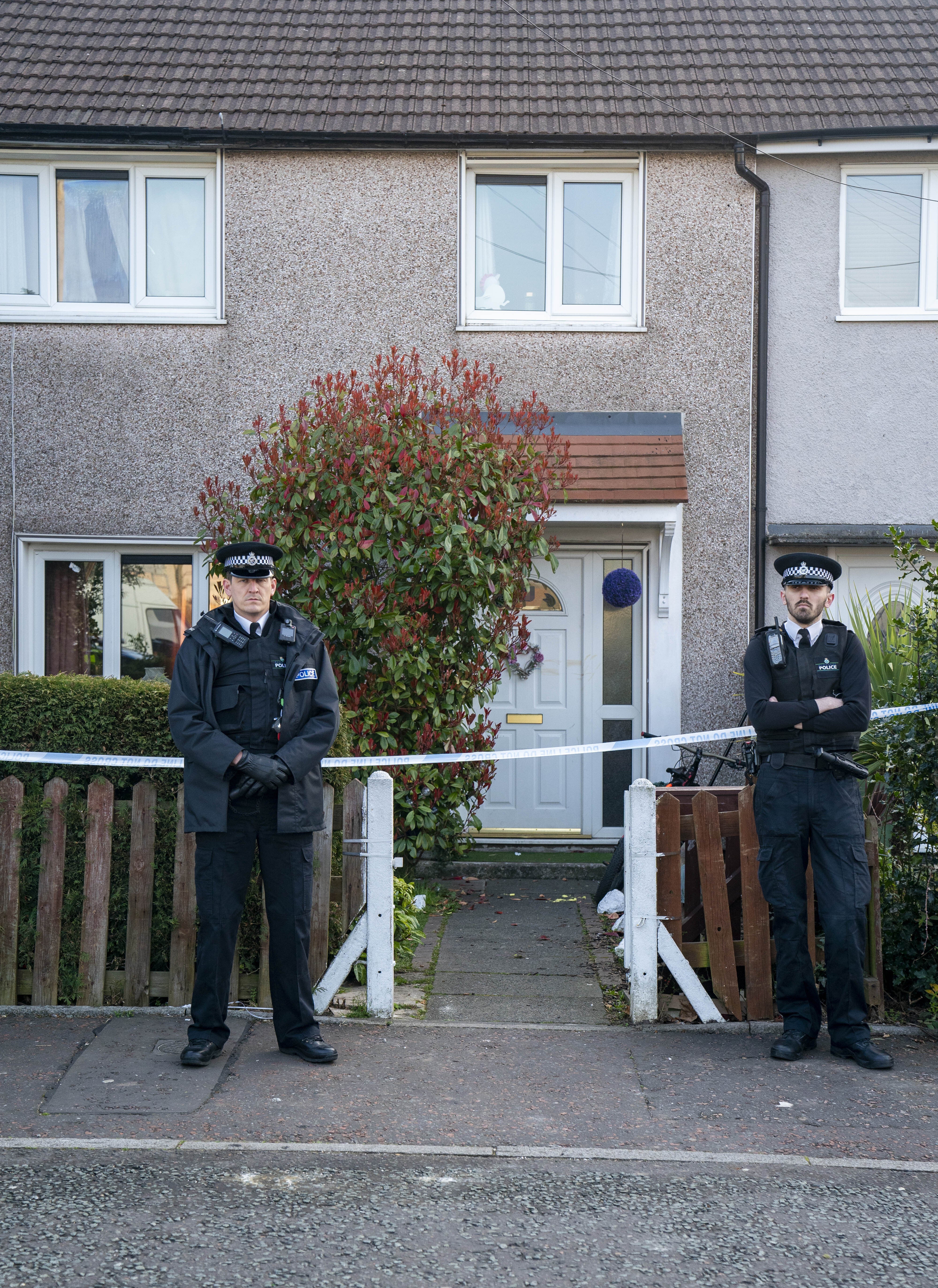 Police outside a house in St Helens after a 17-month-old girl died after being attacked by a dog (Peter Byrne/PA)