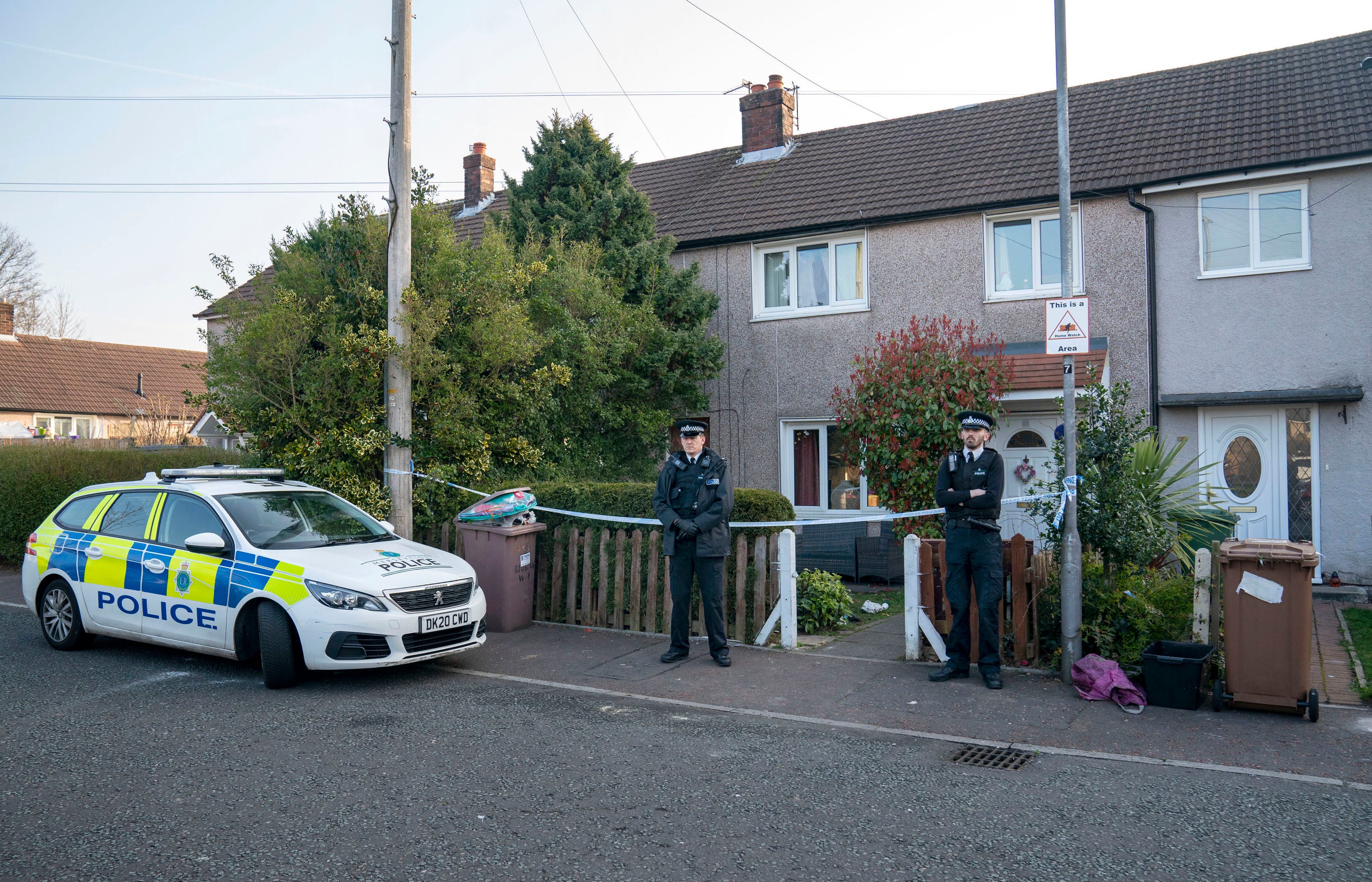 Police outside a house in St Helens after a 17-month-old girl died after being attacked by a dog