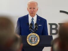 Biden news – live: Conspiracy theorists pounce on president’s ‘new world order’ comments