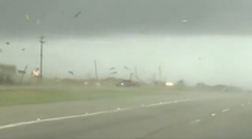 Wild video shows pickup truck being tossed by Texas tornado before landing upright and driving off