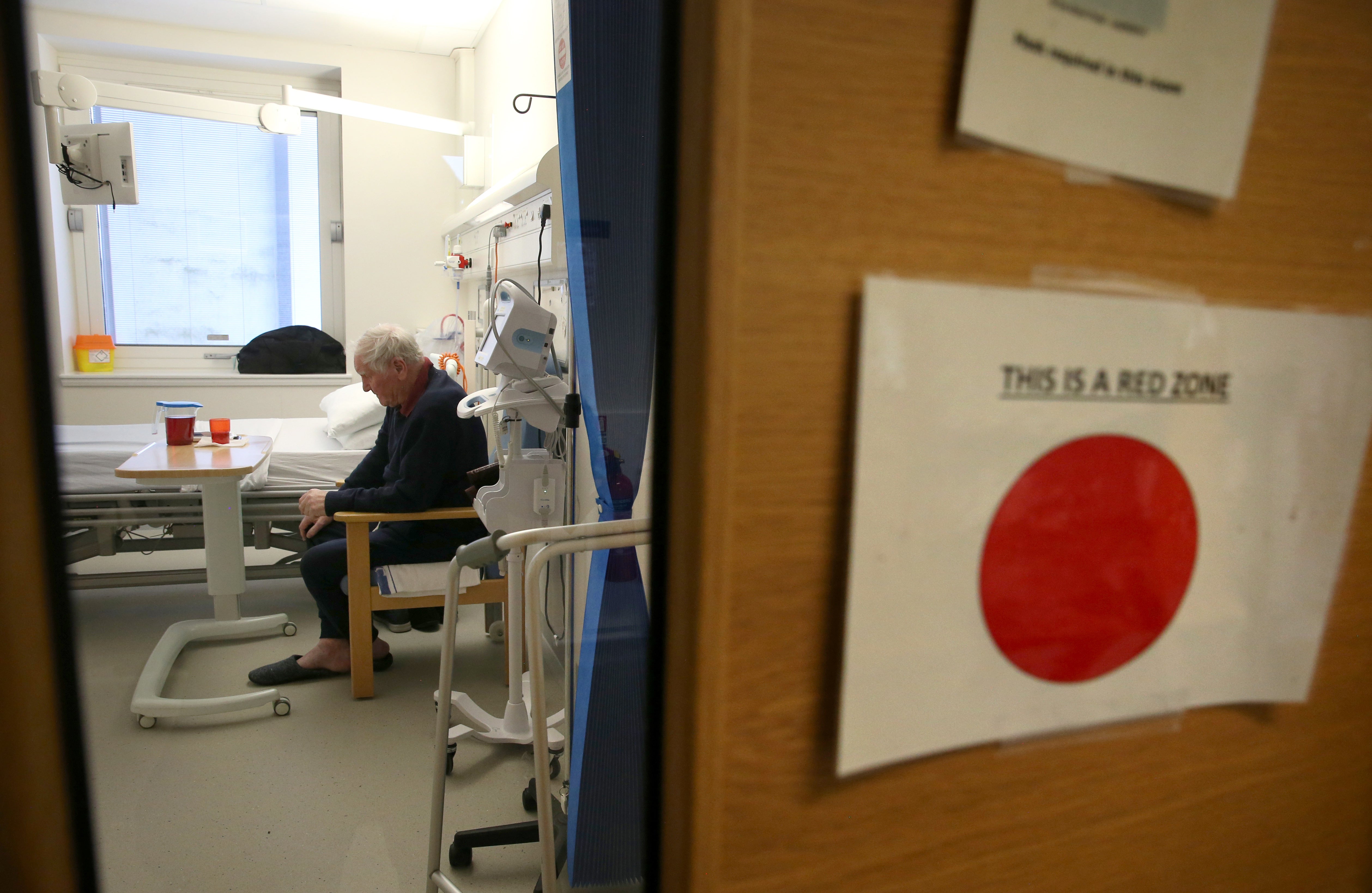 Scotland’s hospitals are dealing with a record number of Covid patients, the latest figures showed (Andrew Milligan/PA)
