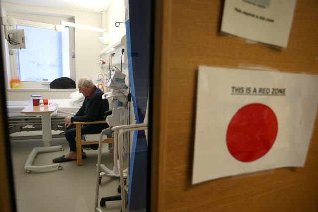 Scotland’s hospitals are dealing with a record number of Covid patients, the latest figures showed (Andrew Milligan/PA)