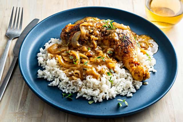 <p>Smothered chicken is a traditional Southern dish where chicken parts are braised with aromatics and liquid to form a luscious gravy</p>