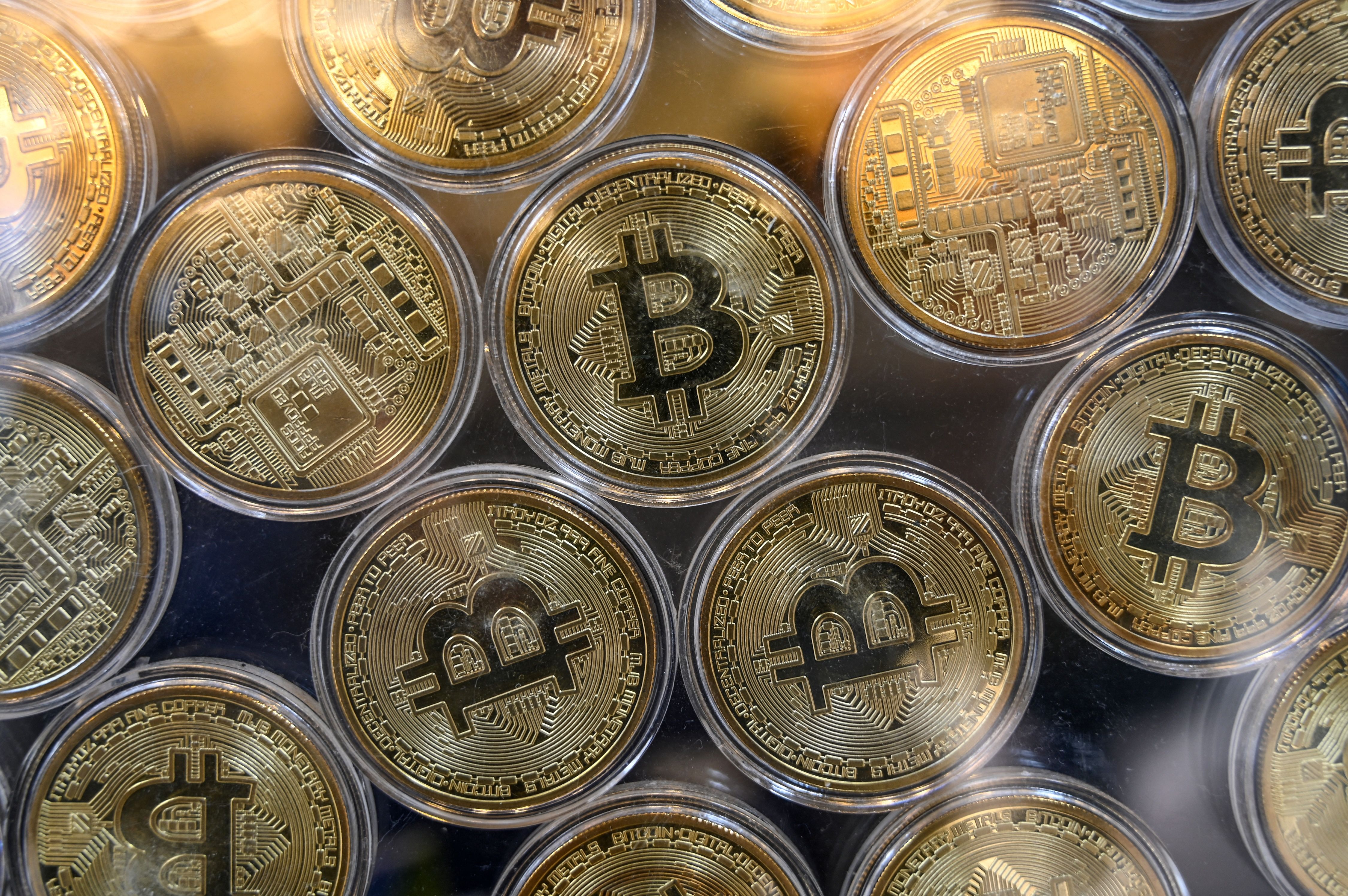 File photo: Physical imitation of Bitcoins are pictured at a cryptocurrency exchange