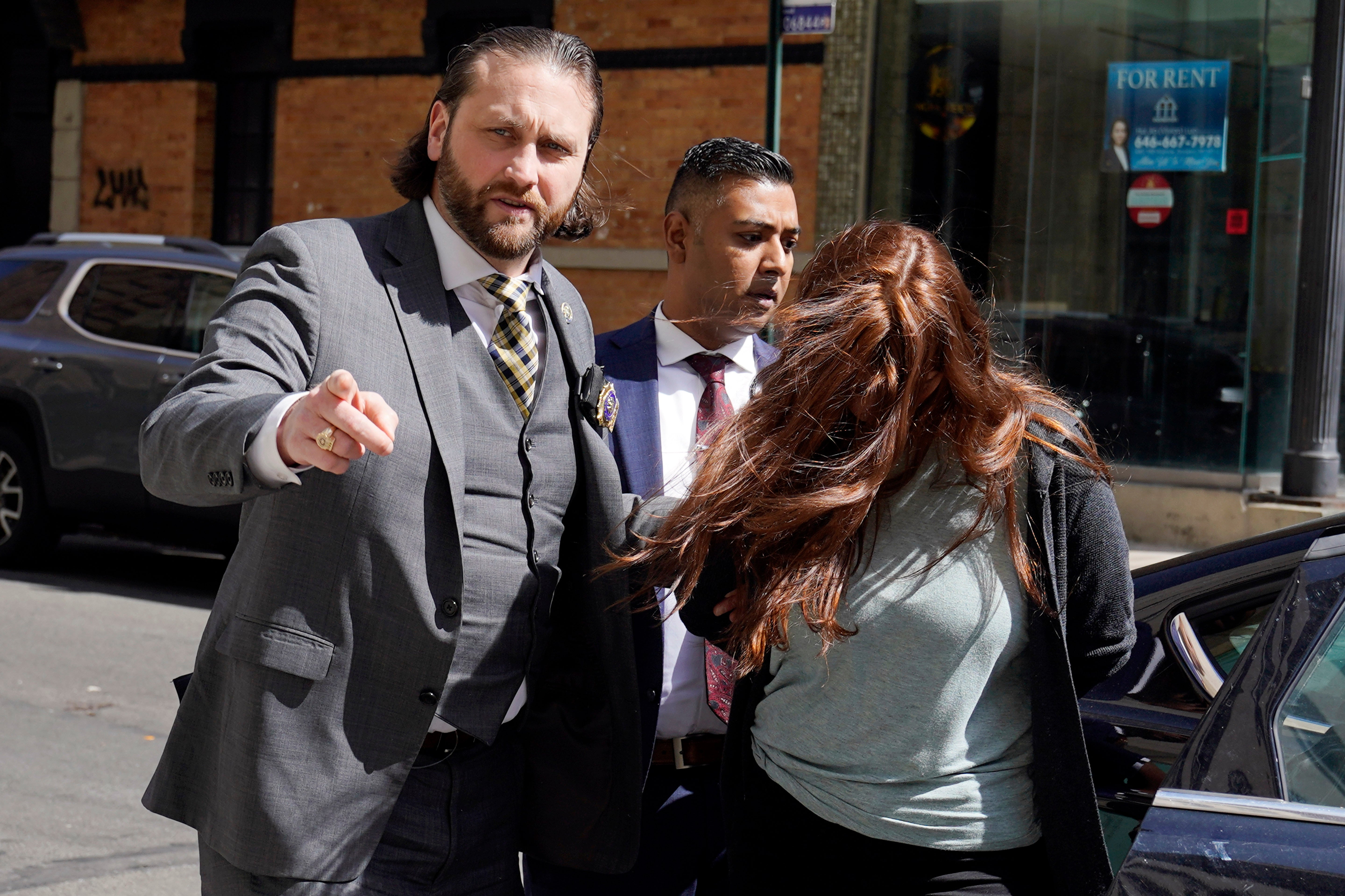 Lauren Pazienza, 26, of Port Jefferson, NY, who was arrested in the death of a 87-year-old Broadway singing coach, arrives at court, in New York, Tuesday, March 22, 2022