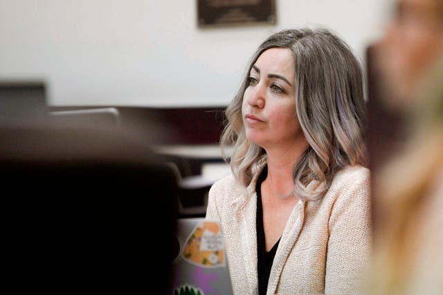 <p>RaDonda Vaught, a former Vanderbilt University Medical Center nurse charged with in the death of a patient, listens to the opening statements during her trial at Justice A.A. Birch Building in Nashville, Tenn., Tuesday, 22 March 2022. </p>