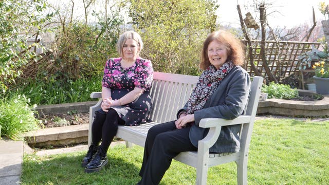 Deputy minister Julie Morgan with Marie Jones, an unpaid carer who will benefit from the £500 payment, at Bridgend Carers Centre (Welsh Government/PA)
