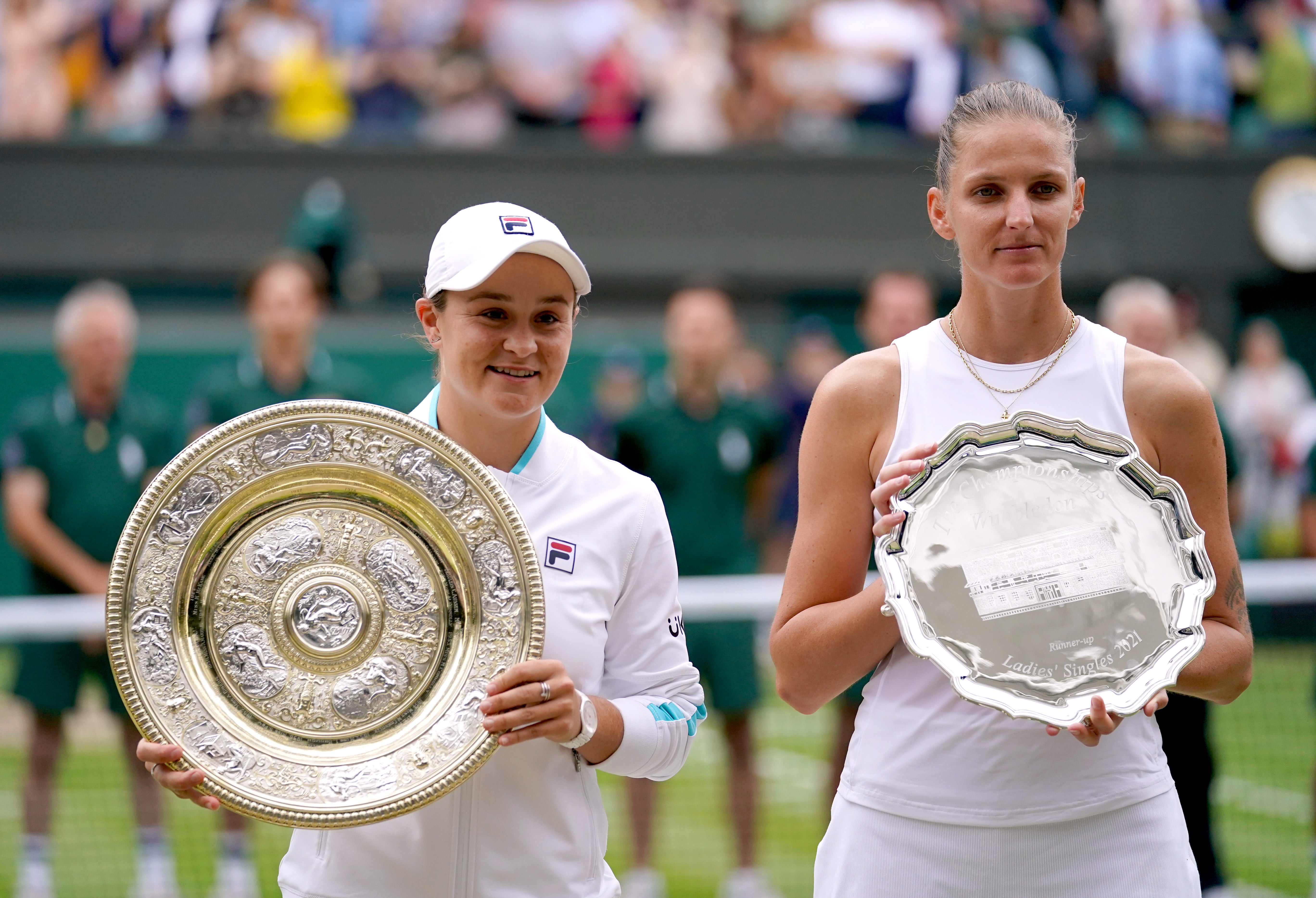 Ashleigh Barty (left) with her trophy after winning the ladies’ singles final match and runner up Karolina Pliskova with her trophy (Adam Davy/PA)