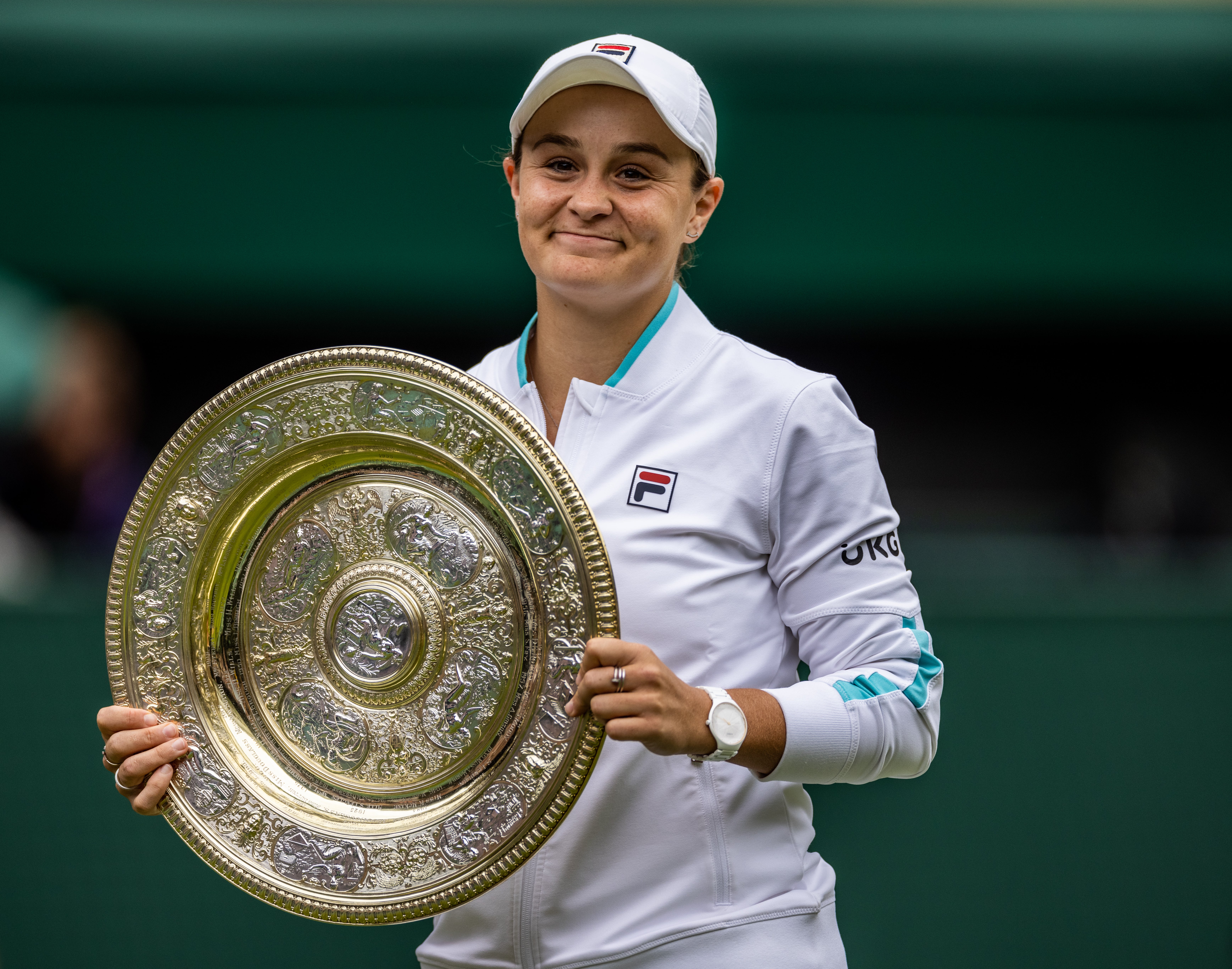 Ashleigh Barty celebrates with her trophy after winning the ladies’ singles final match against Karolina Pliskova at Wimbledon in 2021 (Steven Paston/PA)