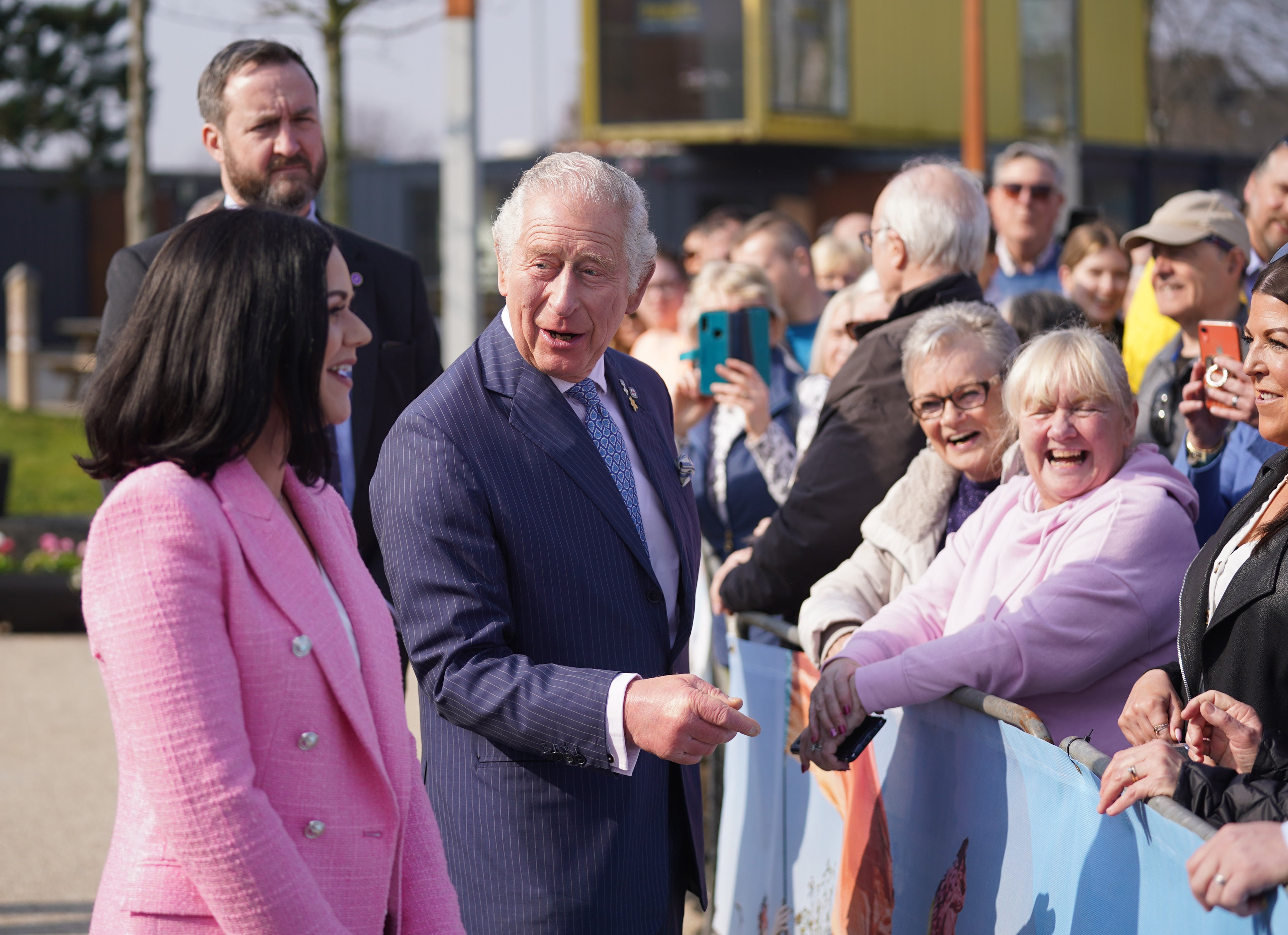Charles speaks to members of the public during a tour of CS Lewis Square, Connswater Greenway, Belfast (Niall Carson/PA)