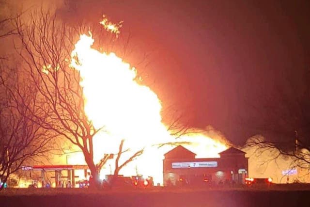 <p>A fire near a Exxon gas statin in Mansfield, Texas</p>