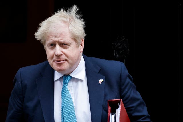 <p>Boris Johnson on his way to Prime Minister’s Questions in the Commons on Wednesday </p>