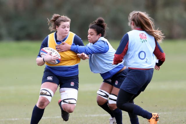 <p>Sarah Beckett is tackled in England training in 2020</p>