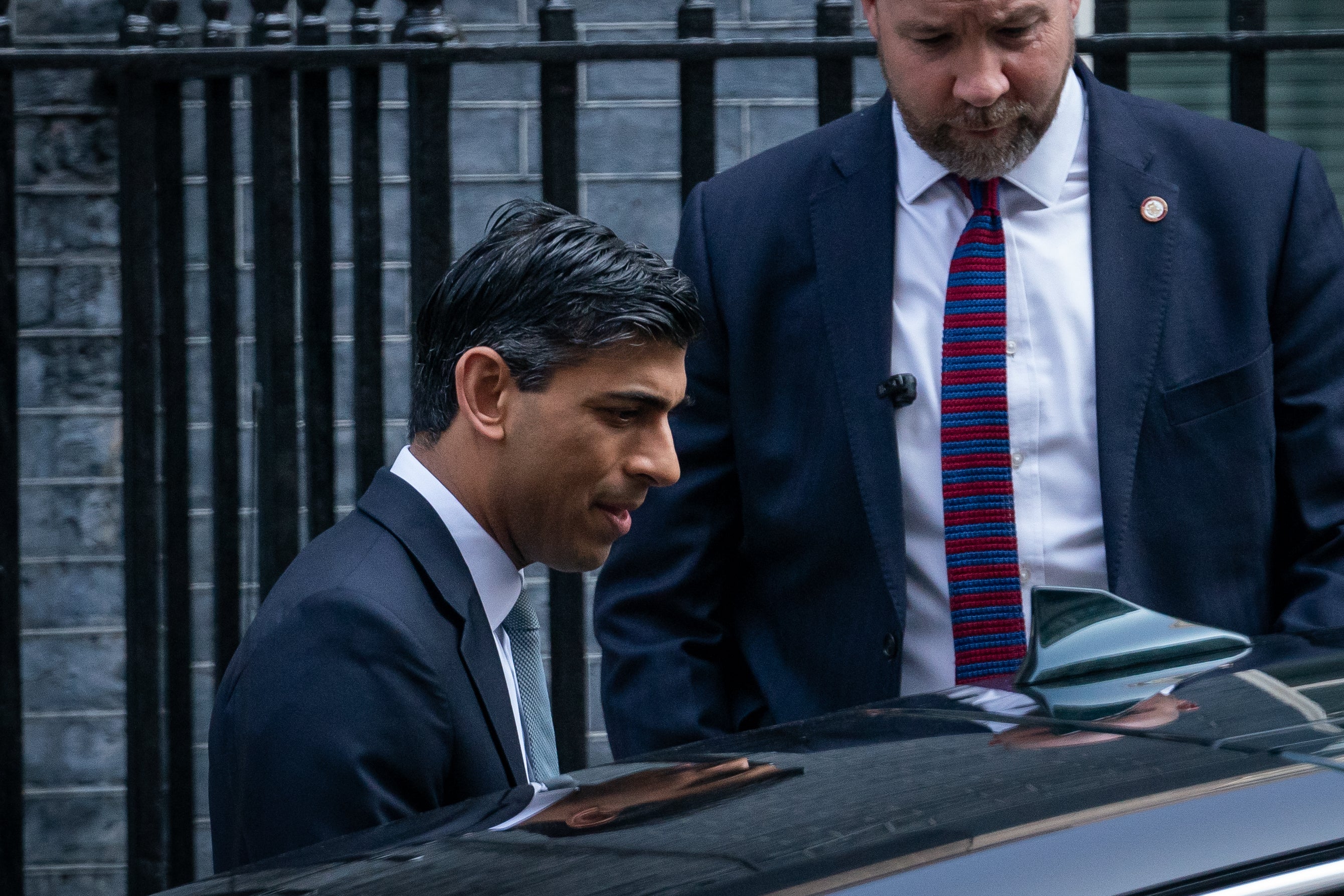 Sunak leaves Downing Street for the spring statement