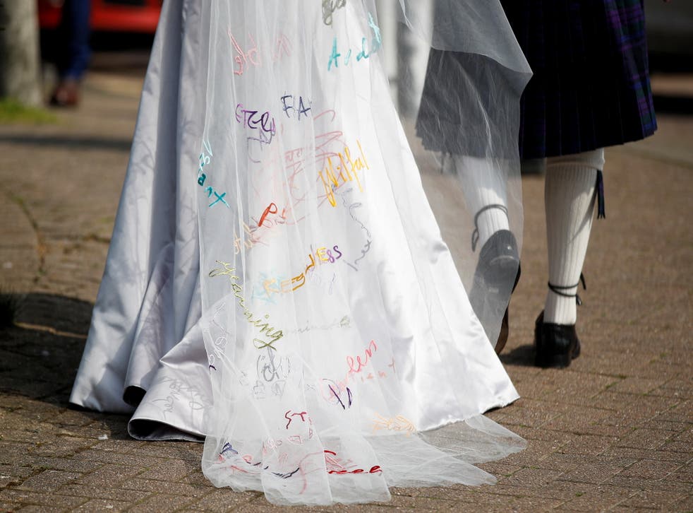 <p>A view shows a detail of the wedding dress worn by Stella Moris, partner of WikiLeaks founder Julian Assange</p>