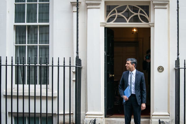 Chancellor of the Exchequer Rishi Sunak leaves 11 Downing Street ahead of his spring statement (Aaron Chown/PA)