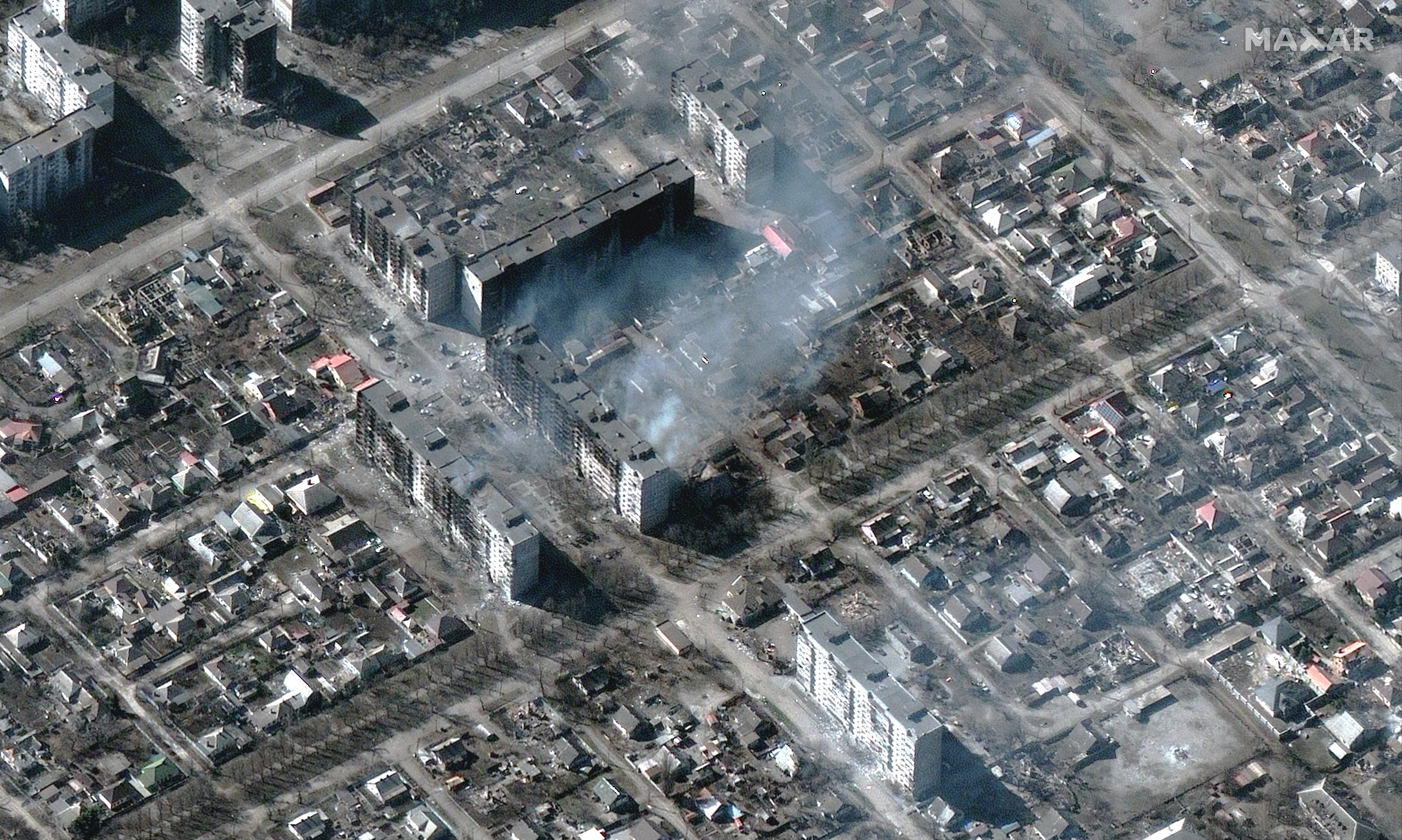 Burning highrise apartment buildings in Mariupol following Russian attacks