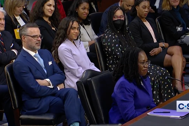 <p>Leila Jackson, daughter of Supreme Court nominee Ketanji Brown Jackson, sits behind her mother at her confirmation hearing</p>