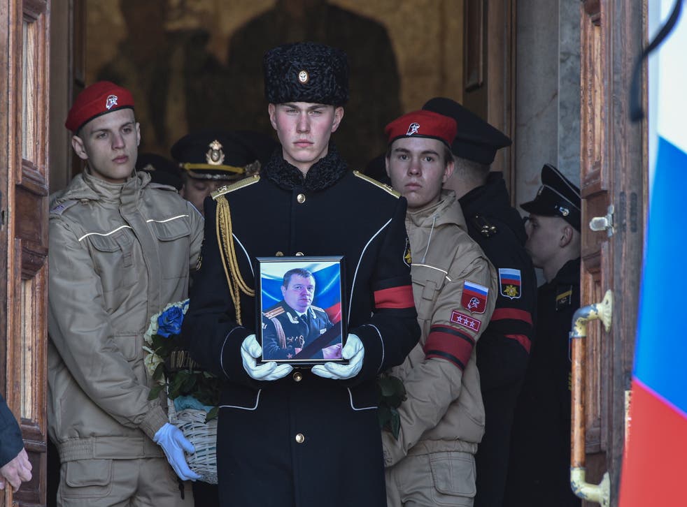 <p>The coffin of Andrei Paliy, the deputy commander of the Black Sea Fleet, is carried in Sevastopol, Crimea, on 23 March 2022</p>