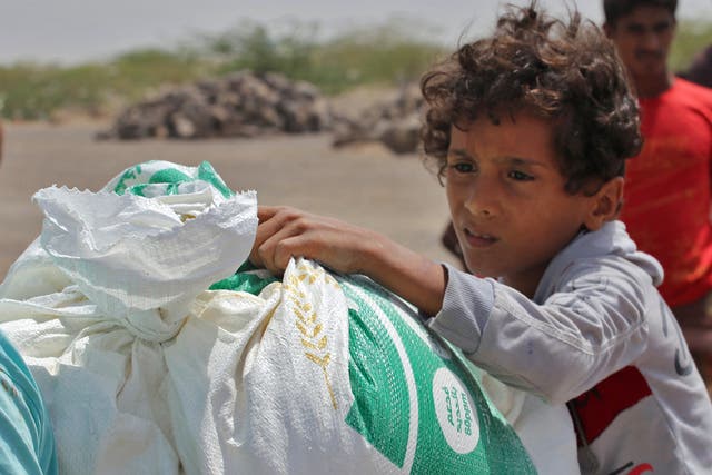 <p>The UN provides food assistance to 13 million people per month in Yemen but rations have been halved </p>