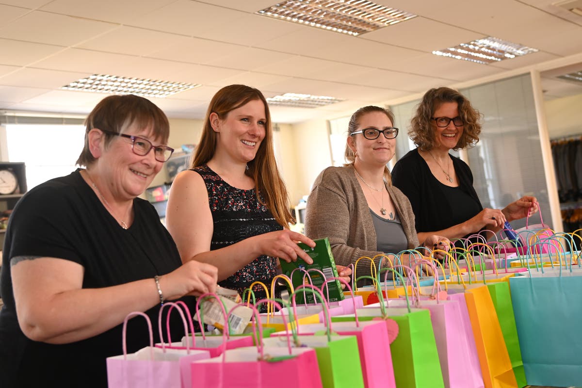 Lottery-winning mums help out at crisis charity Lottery-winning mums help out at crisis charity