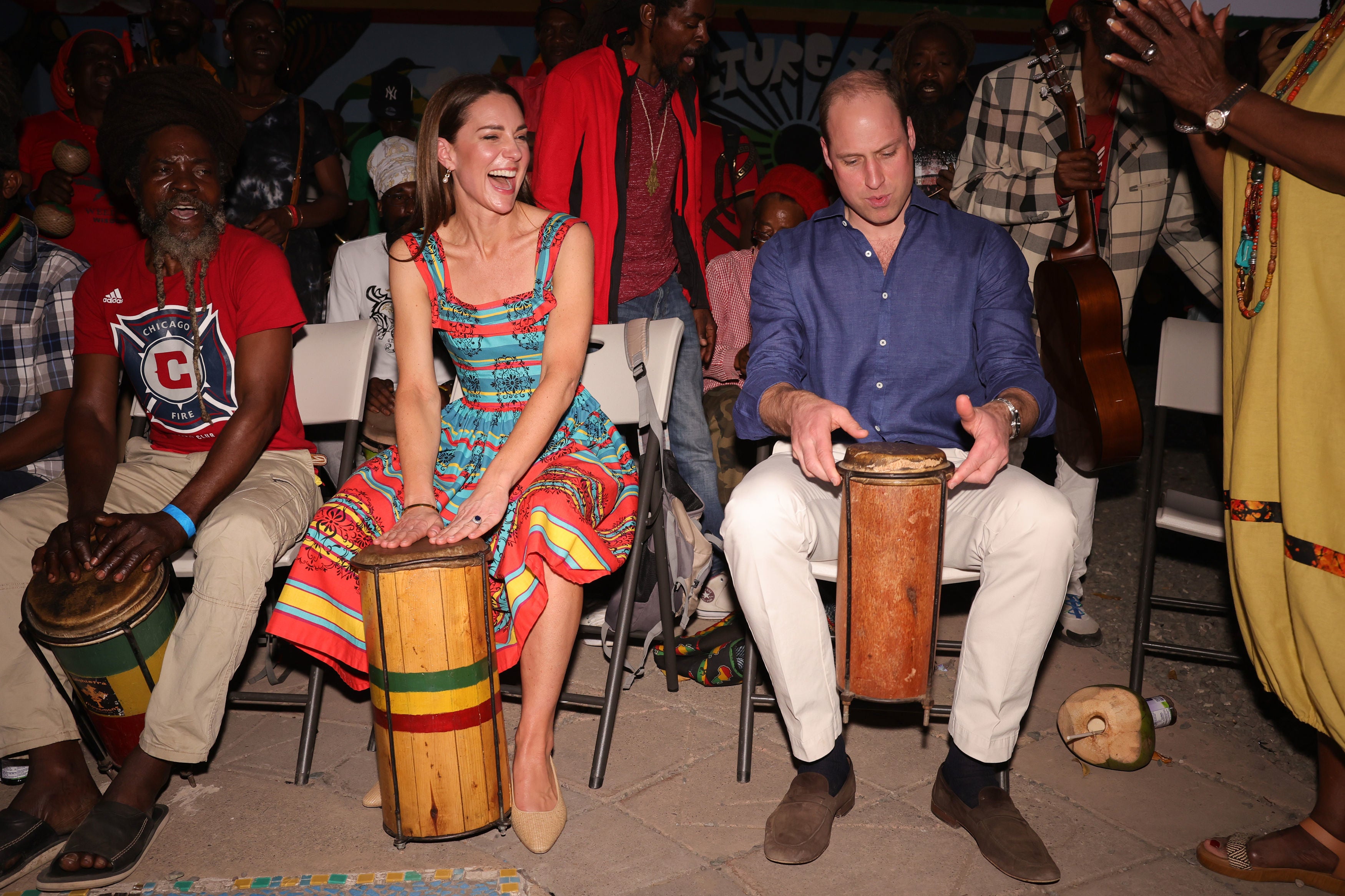 The couple play music during a visit to the former home of musician Bob Marley in Kingston