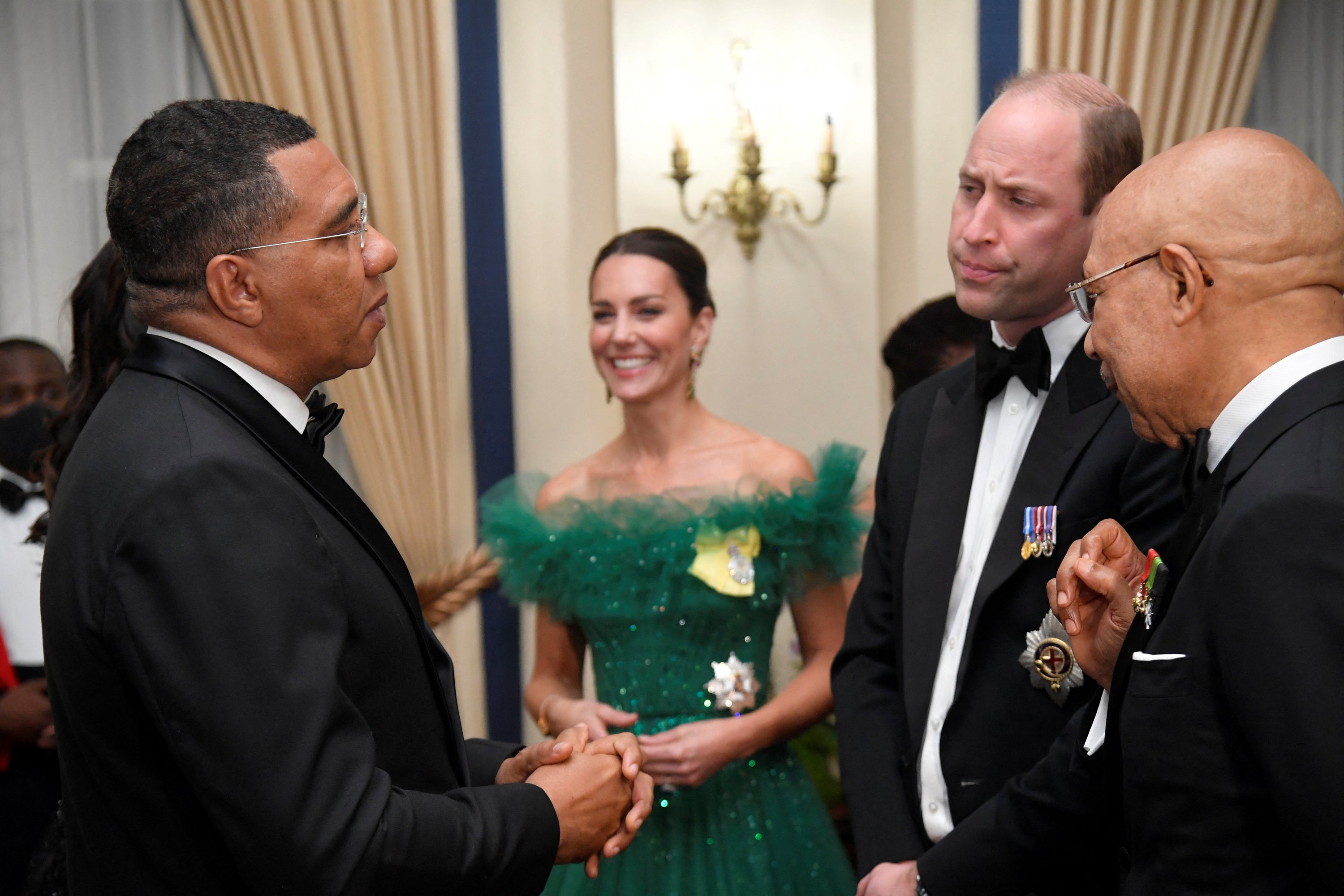 The Duke and Duchess of Cambridge (centre) talk with Jamaica’s Prime Minister Andrew Holness (left) and the Governor General of Jamaica Patrick Allen (right) (Toby Melville/PA)
