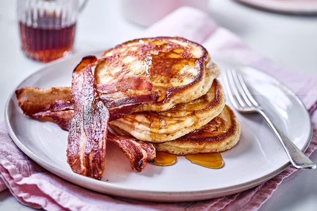 <p>Hoping to feed the family a healthy twist on this breakfast classic? Try serving the pancakes with fresh fruit instead of the bacon and syrup</p>