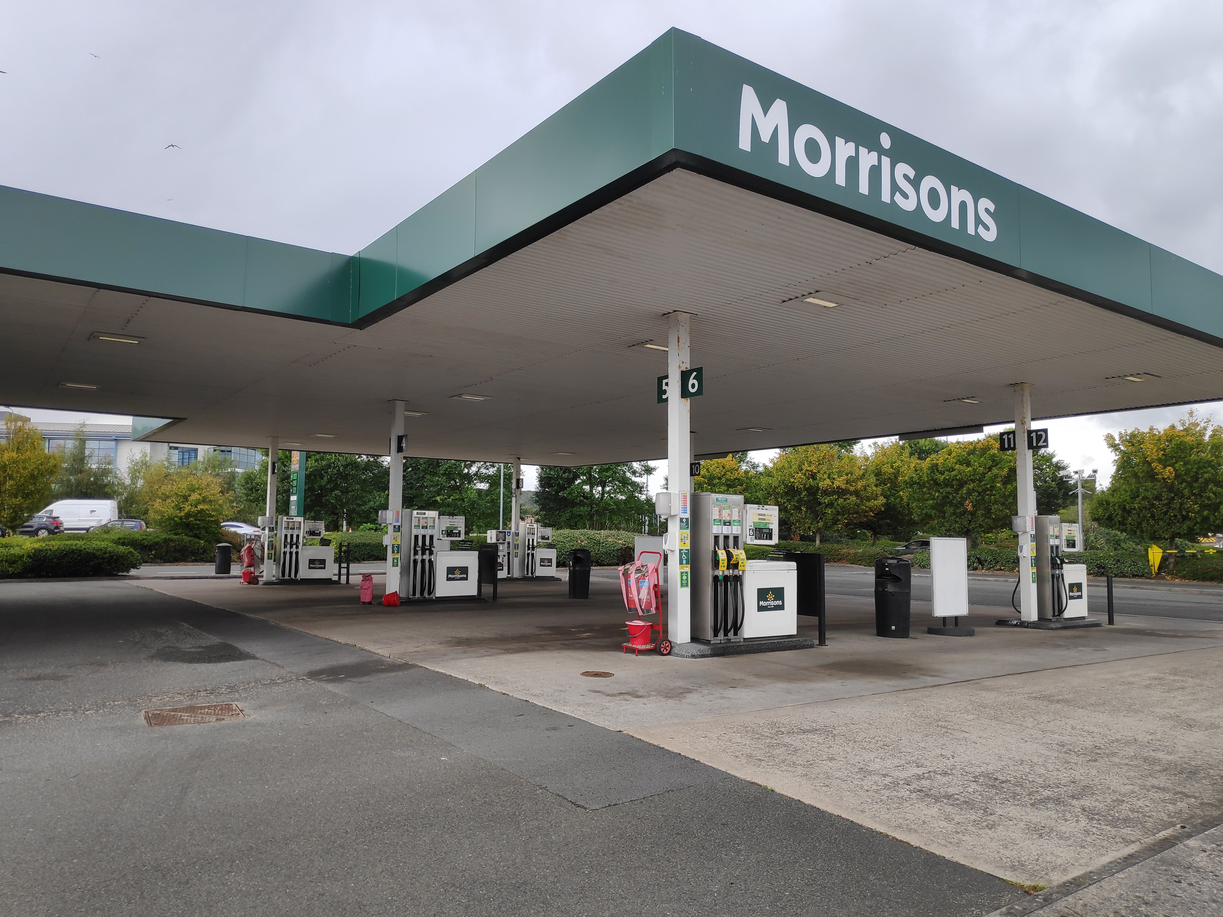 The regulator is concerned the takeover of Morrisons could lead to higher fuel prices in a number of locations (PA)