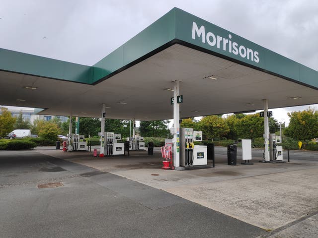 The regulator is concerned the takeover of Morrisons could lead to higher fuel prices in a number of locations (PA)