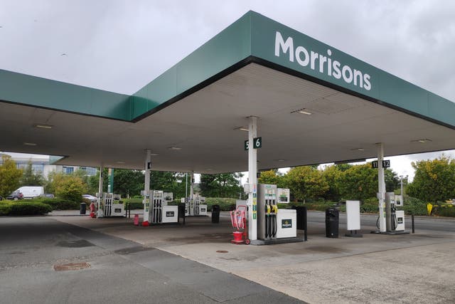 The regulator is concerned the takeover of Morrisons could lead to higher fuel prices in a number of locations (PA)