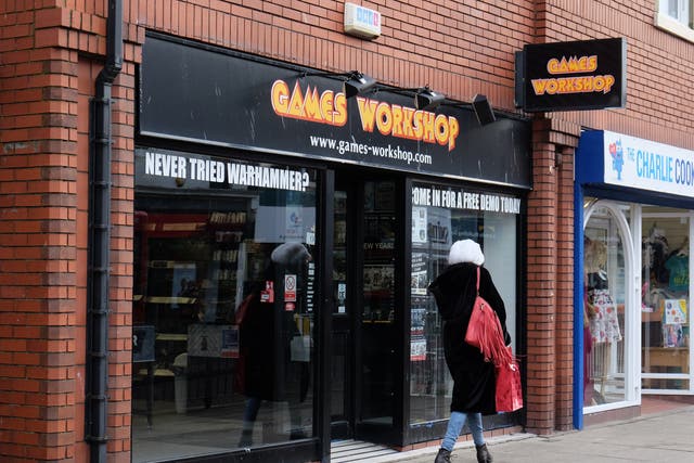 Shares in Games Workshop rose as it reported positive trading figures (PA)