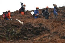 China plane crash: Search teams find key parts of downed jet - but still seek second black box