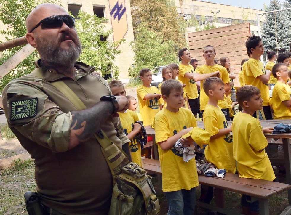 <p>Children taking part in military training with Azov Battalion volunteers in Kyiv in August 2015</p>