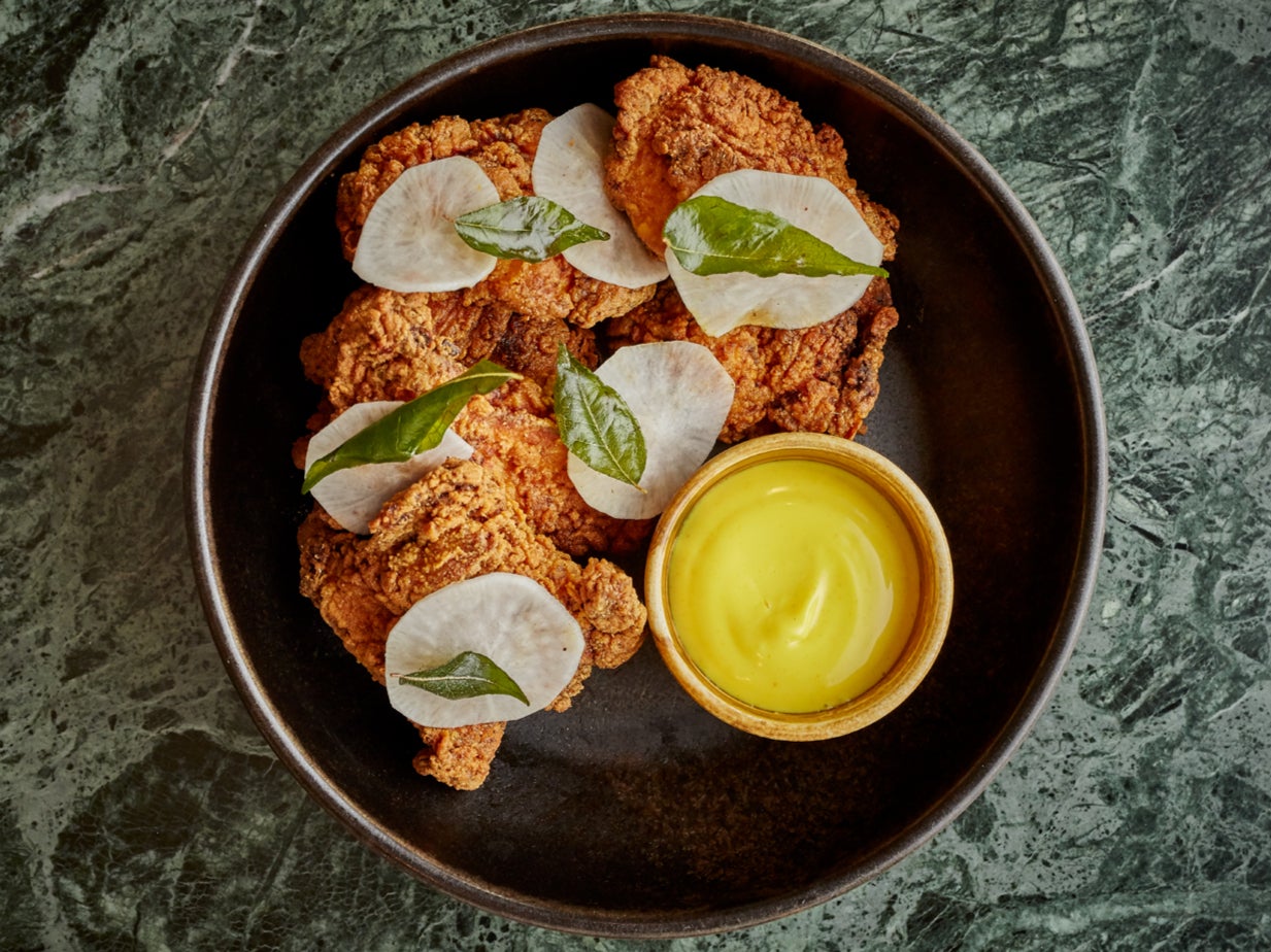 Kricket’s very own fried chicken recipe adapts a basic tandoori marinade and makes use of a small gas fryer