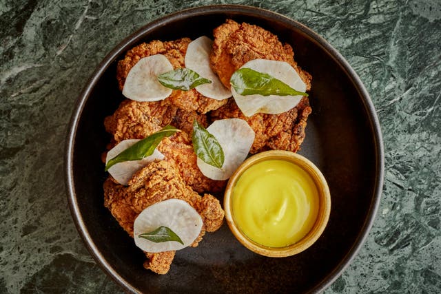 <p>Kricket’s very own fried chicken recipe adapts a basic tandoori marinade and makes use of a small gas fryer</p>